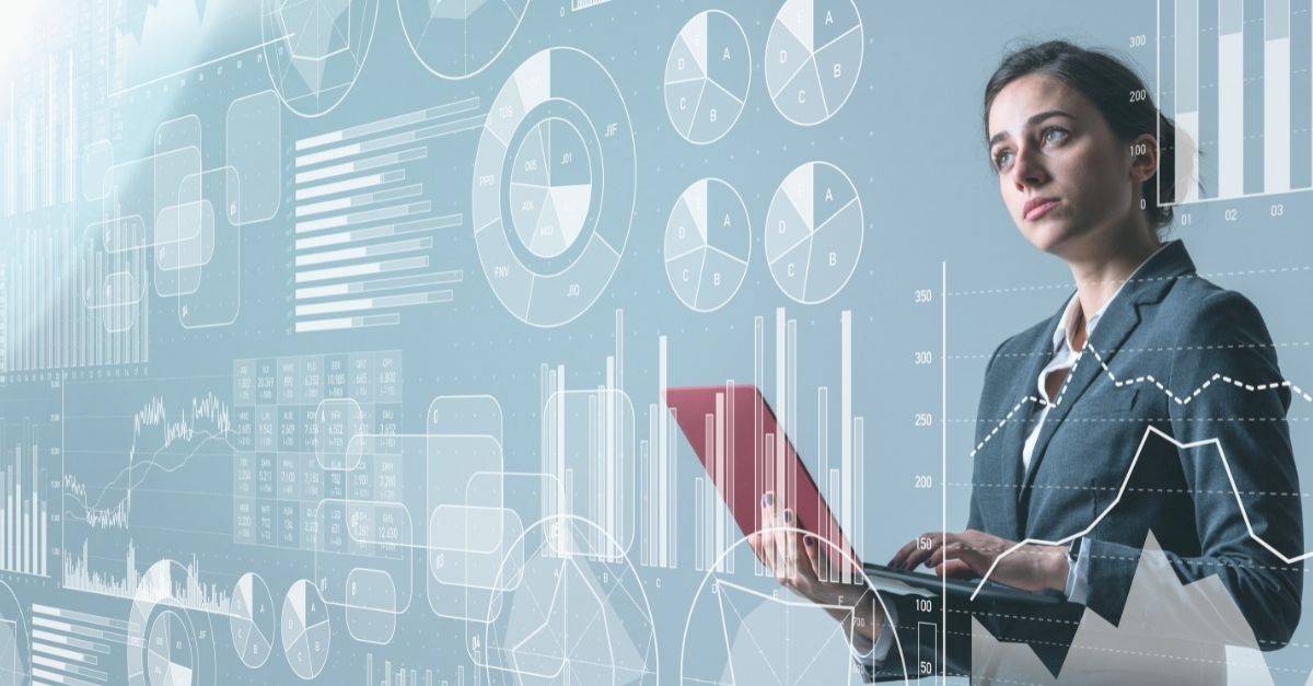 woman studying data in front of her