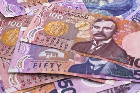 RBNZ surprises, slashing rate to record low