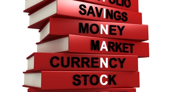 a stack of books labelled with different investment options