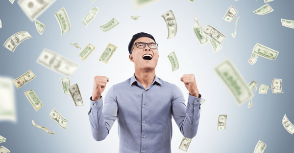 dollar_bills_raining_on_an_excited_man