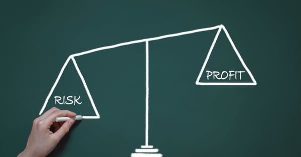 weighing_scale_with_risk_on_one_end_and_profit_on_the_other